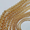 100 Pcs Smooth Round Glass Beads For Crafts Making gold transparent
